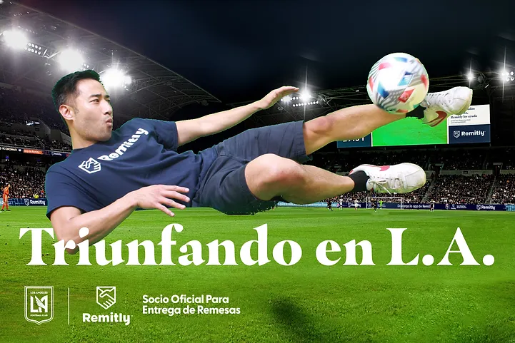 Soccer player executing a kick at a sports-themed photo booth.