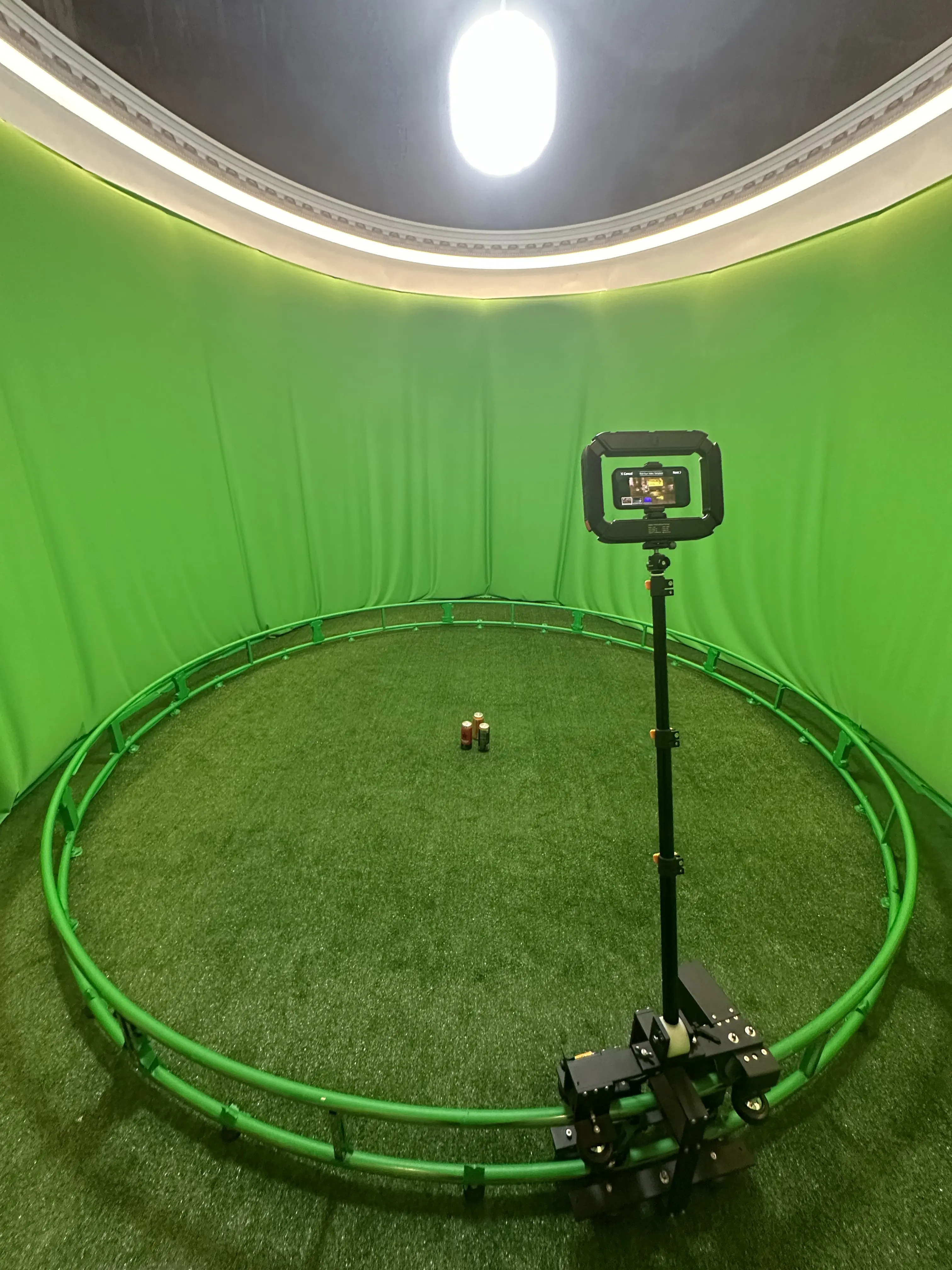 360 video booth with green screen setup at event