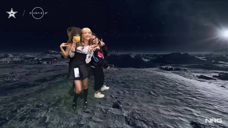 Women posing on a lunar surface backdrop at a 360 photo booth event.