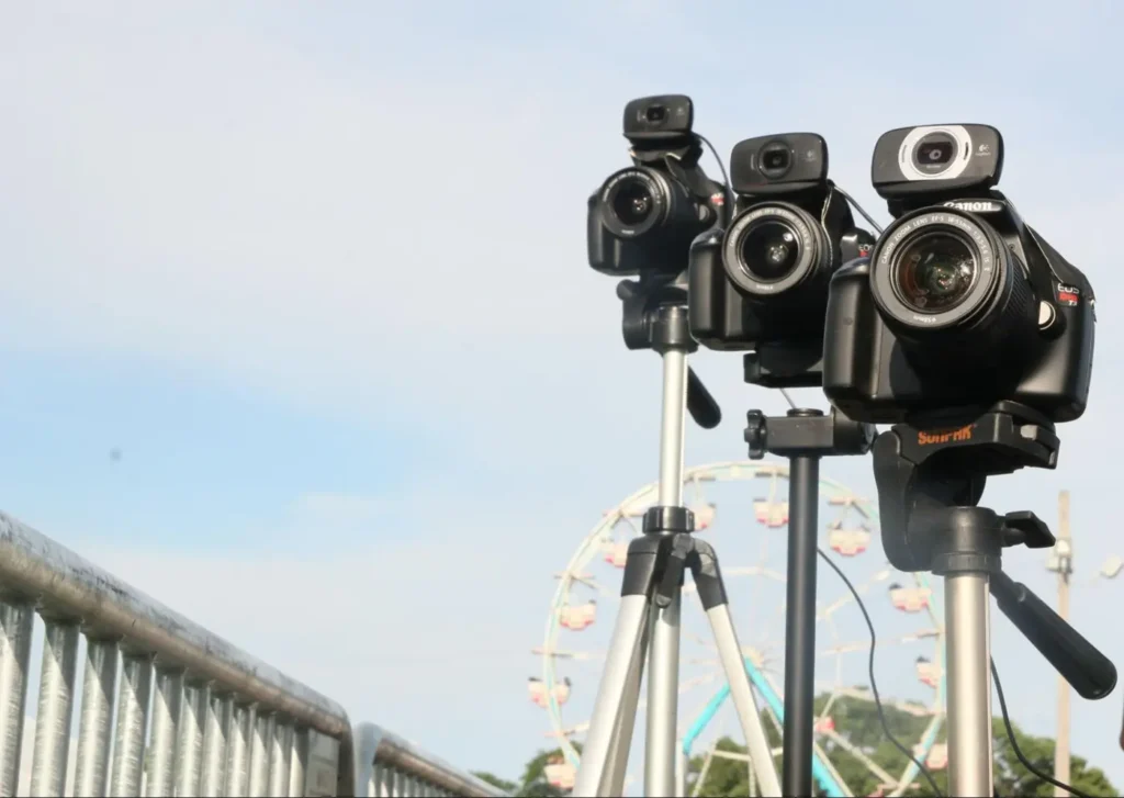 Professional cameras on tripods for live event streaming