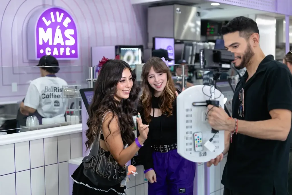 Experiential marketing activation showing consumers emotionally engaging with a brand experience