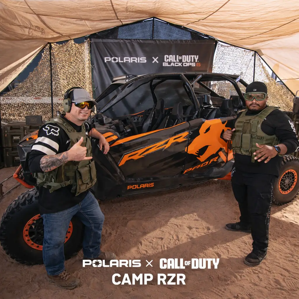 Guests engaging with an interactive branded activation at a live event produced by GC Event Studio